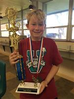 student with trophy 